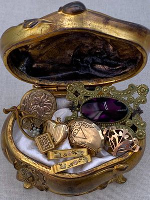 Antique Art Nouveau Jewel Casket full of Victorian to Art Deco era Jewelry. Ornate gilded metal 