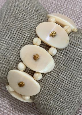 Gold Nugget Trimmed Polished Panel Bracelet. Natural material curved oval panels and beads on a 
