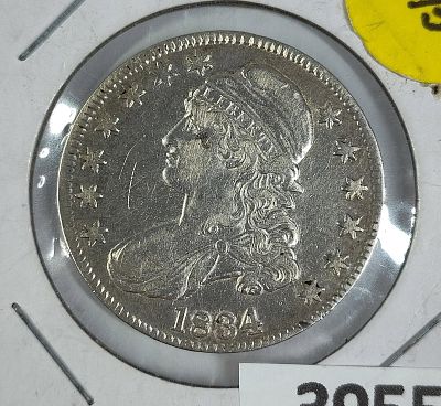 1834 Capped Bust Silver Half Dollar Large Date. showing wear