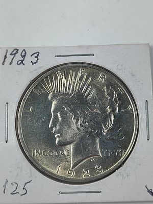 1923 XF Peace Silver Dollar. Appears to be UNC?90% Silver?