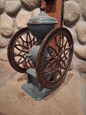 Lane Brothers Swift Mill Double-Wheel Iron Grinder. 9.5 x 18. This is an antique tabletop coffee 