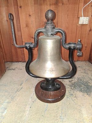 Brass Steam Locomotive Bell on Cast Iron Stand. Bell is 12 inches at flared bottom 25 in tall. 