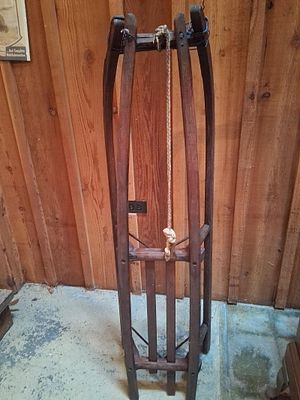 Antique Davos-Style Wooden Sled. An antique wooden sled constructed in the Davos style. The 