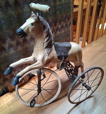 Antique Victorian Style Horse Velocipede Tricycle. This antique child's tricycle features a 