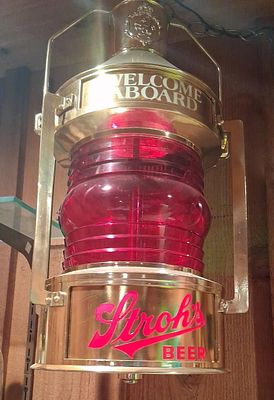 Stroh's Beer Welcome Aboard Nautical Light Fixture. Lights and rotates. 9x21. This vintage 