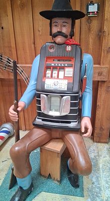 Mills Westerner Cowboy Figural Slot Machine. 24x26x61. This lot consists of a Mills Novelty 