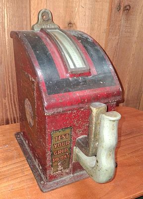 1 Cent Coin Operated Arcade Grip Strength Tester. This coin-operated arcade machine is a 
