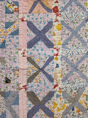 Mid-20th C. Criss-Cross Patchwork Feed Sack Quilt. 67 x 78 This is a hand-pieced and 
