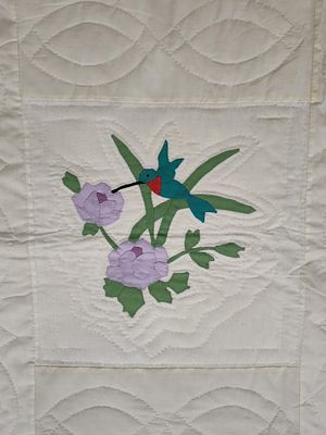 Mid-20th Century American Hand-Appliqued and Hand-Quilted Cotton Sampler Quilt. 80 x 100 An 