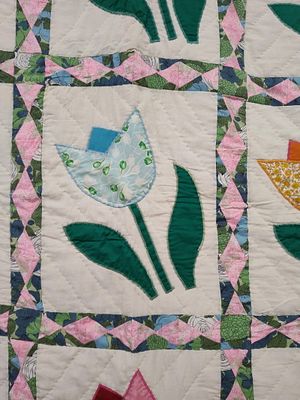 Applique Tulip Quilt w/ Floral Diamond Sashing. 50 x 88 This vintage handmade textile is an 