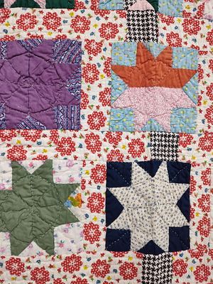 Hand-Stitched 8-Point Star Patchwork Quilt. 60 x 66 A mid-20th-century American handmade 