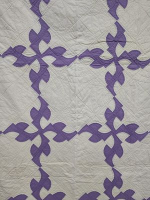 Purple & White Whirligig Pattern Cotton Quilt. 66 x 80 This vintage textile is a hand-stitched 