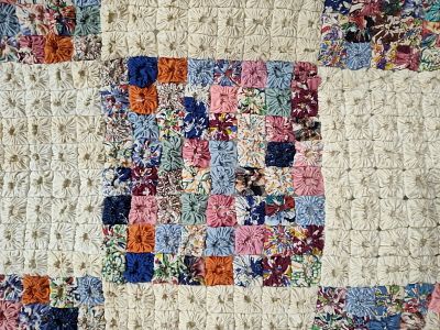 Hand-Stitched Yo-Yo Checkerboard Feedsack Quilt. 70 x 84 This hand-stitched yo-yo quilt features 