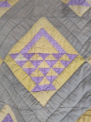 Amish Style Hand Quilted Basket Pattern Quilt. 66 x 84 This pieced and hand-quilted cotton 