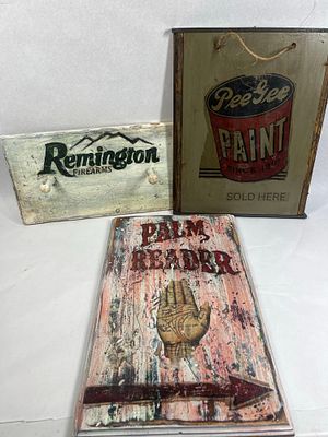 Trio Modern Distressed Wood Signs. A collection of three contemporary decorative wooden signs 
