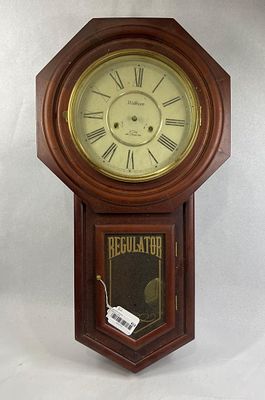 Waltham 31-Day Chime Regulator Clock. 30x16x5 A wall-mounted clock designed in the octagon drop 