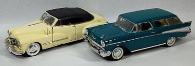 1957 Nomad" (Wait, & and space). Both 11 in tall. A pair of 1:18 scale die-cast model 