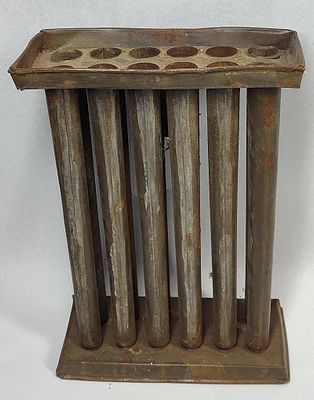 19th C. American 12-Tube Candle Mold. 10.5x7.5x3.5 This antique 12-tube candle mold is a 