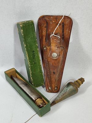 Pair Vtg Surveyor Plumb Bobs w/ Box. This lot features two vintage surveyor plumb bobs, one 