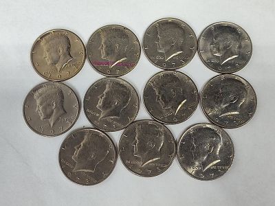 A Group of US 1973 Kennedy Half Dollars. A group of US Kennedy half dollars dated 1973. Struck 