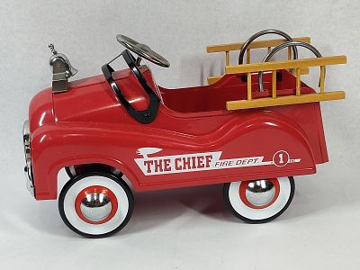 Pressed Steel Fire Engine Pedal Car. 10 inches. This item is a contemporary decorative scale 