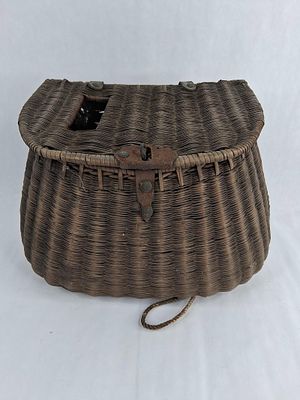 Wicker Pot-Bellied Fishing Creel. This antique fishing creel is constructed from hand-woven 