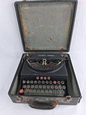 Monarch Pioneer Typewriter w/ Case. 12x12x4 in working condition This is a Monarch Pioneer 