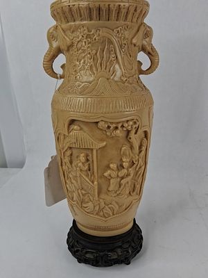 Chinese Faux Ivory Resin Vase w/ Stand. This decorative vase is constructed from molded resin in 