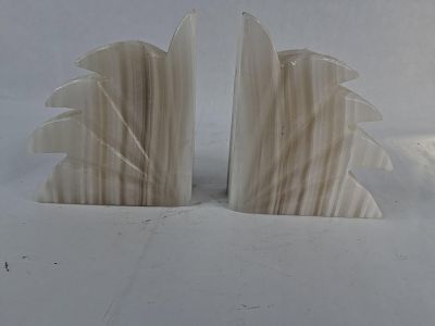 Pair Mexican Modernist Onyx Bookends. A matched pair of carved stone bookends, fashioned from 
