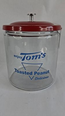 Tom's Peanuts Blue Print Jar w/ Red Lid. 9 in tall A vintage advertising countertop display jar 