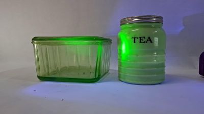 Green Uranium Glass Dish & Canister. This lot features two functional glass storage items from 