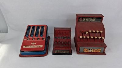 3 American Metal Toy Adders & Regs. This lot features a collection of three 
