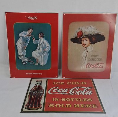 Trio Coca-Cola Lithographed Metal Signs. 12x16 A collection of three vintage-style Coca-Cola 