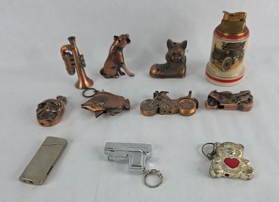 Novelty Lighters, Keychains & Figurines. This collection features a variety of novelty lighters 