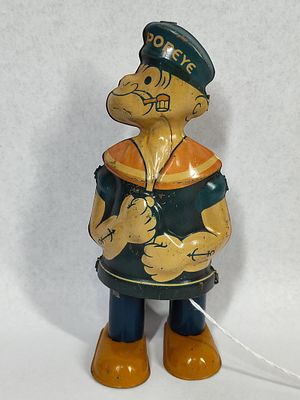 J. Chein & Co. Wind-up Walking Popeye. 6.5 in tall. This mechanical wind-up walking figure was 