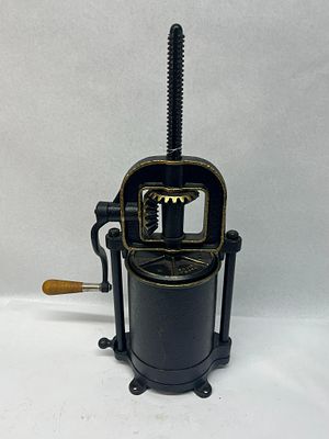 Landers Frary & Clark Stuffer & Press. A bench-mounted American cast iron press designed for 