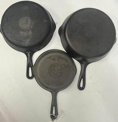 Griswold Small Logo Cast Iron Skillets. This lot comprises three American-made cast iron 