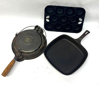 Wapak, Griswold & Wagner Cast Iron Set. A trio of American cast iron cookware featuring pieces 