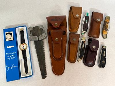 Case Buck Western Knives Saw MDA Watch. An assortment of collectibles including four multi-blade 