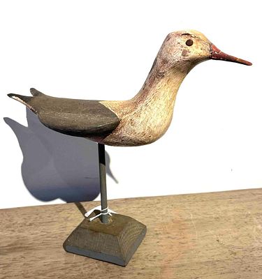 Carved & Painted Wooden Shorebird Decoy. A hand-carved wooden shorebird decoy featuring a 