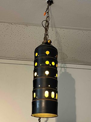 Jet Engine Burner Can Pendant Lamp. An industrial-style pendant hanging lamp constructed from a 