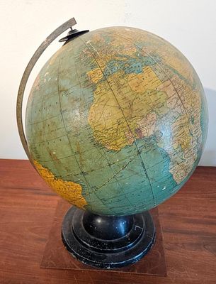 Cram's Terrestrial Globe w/ Meridian. A terrestrial desktop globe featuring printed paper gores 