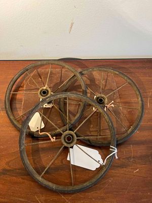 3 Iron Spoke Wheels w/ Rubber Tires. A set of three industrial or toy wheels, likely intended 