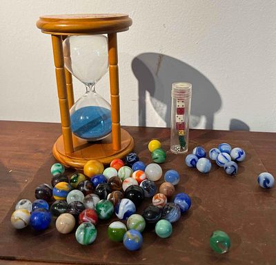 Wood Hourglass, Dice & Glass Marbles. This collection consists of various gaming items including 