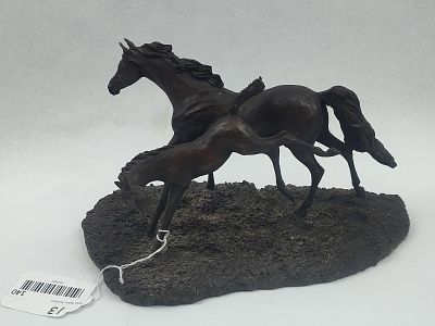 Lanford Monroe Foaling Time Sculpture. This cast sculpture, likely composed of resin with a 