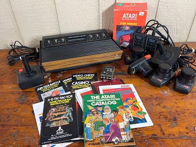 Atari CX-2600 Console & Accessories. This lot features a vintage Atari Video Computer System VCS 