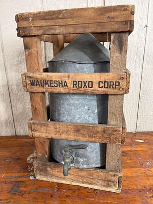 Waukesha Roxo Water Dispenser & Crate. This is a vintage industrial liquid dispenser, likely 