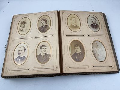 Victorian Gilt Leather Photograph Album. This Victorian-era photograph album is a large quarto 