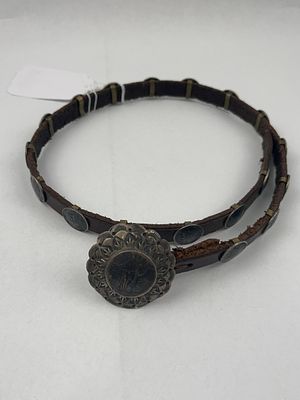 Buffalo Dancer Str. Mercury Concho Belt. This narrow dark brown leather belt features 