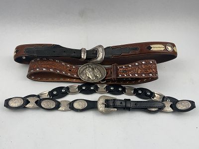 Justin & Western Leather Belts, Trio. A trio of American-made Western-style leather belts. It is 
